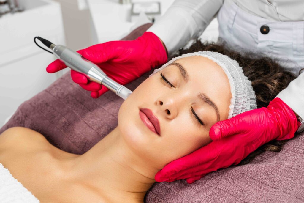 woman receiving microneedling