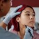 Woman gets markings for cosmetic surgery - Michelle Hardaway M.D.