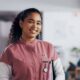 Female nurse in pink scrubs - Michelle Hardaway M.D.